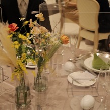 迎賓館の画像｜テーブル装花です。オレンジを中心に依頼しました。