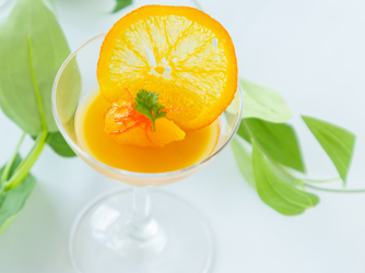 ラソール ガーデン・アリビラ／チュチュリゾートウエディング：フォアグラのパルフェ　沖縄県産タンカンのジュレ　オレンジのチュイルを添えて