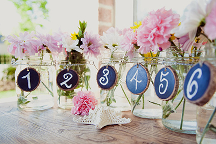 things-brides-love-mason-jar-wedding-reception-decor-centerpieces-chalkboard-table-numbers.original[1].jpg