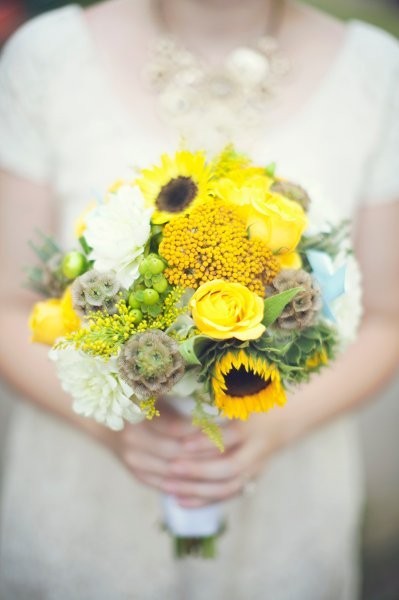 600x600_1411739738877-sunflower-wedding-flowers-soderbergs-floral-and-gi.jpg